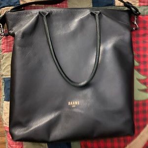 DAAME black leather zipped bag